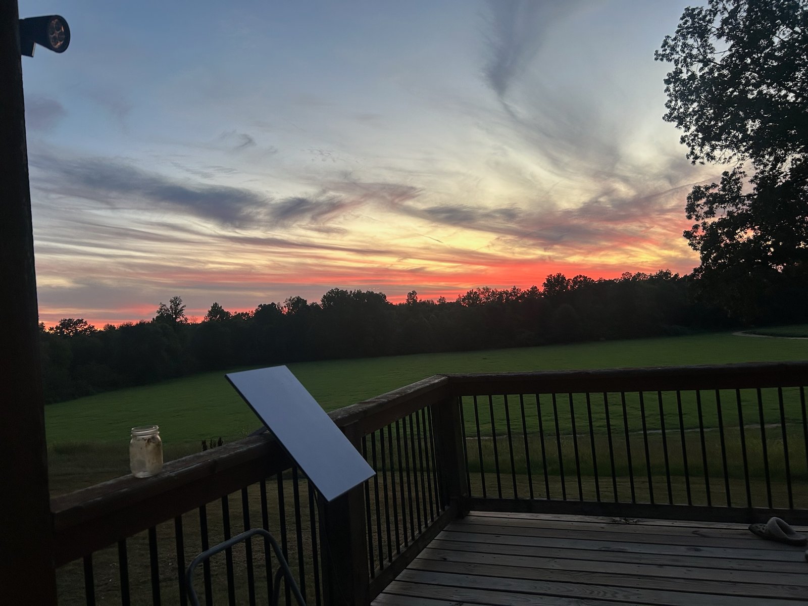 Open cleared property at sunset